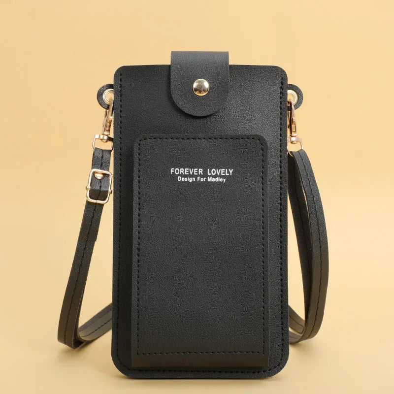 Black crossbody bag with 'Forever Lovely' text on a beige background
