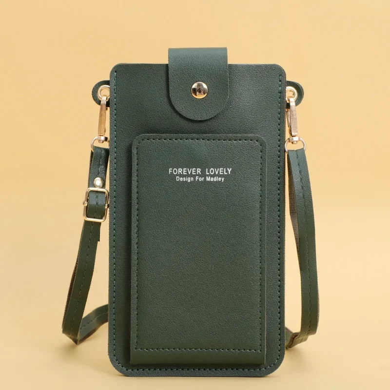Green crossbody bag with 'Forever Lovely' text on a beige background