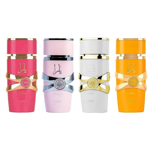 Four colorful bottles with decorative caps on a white background