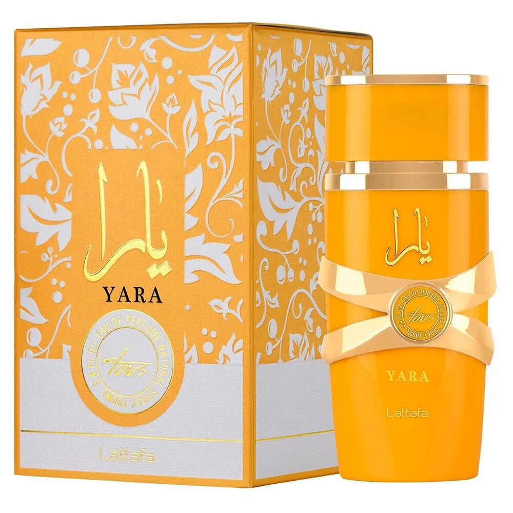 Orange Yara perfume bottle and packaging with intricate designs on a white background